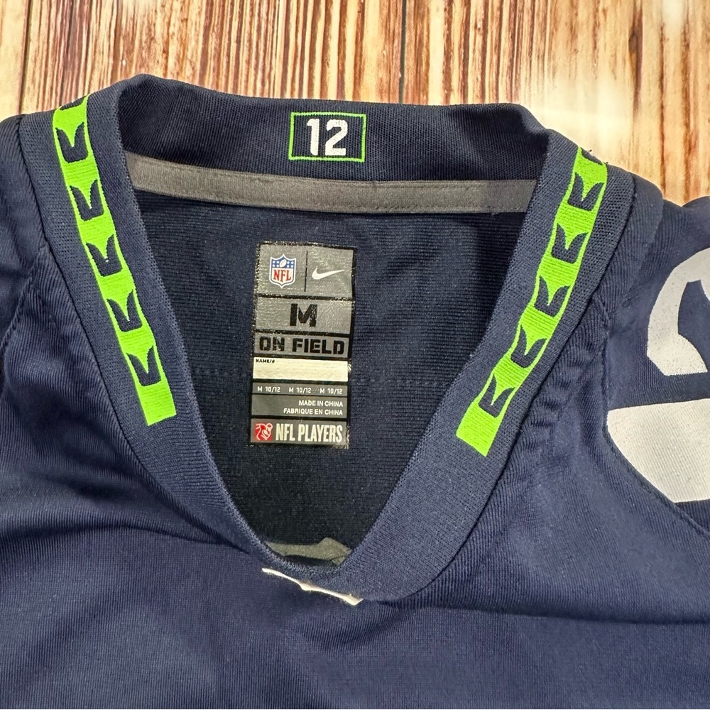 Nike On Field Marshawn Lynch Seattle Seahawks Jersey Size M 10/12 YOUTH - Picture 3 of 13